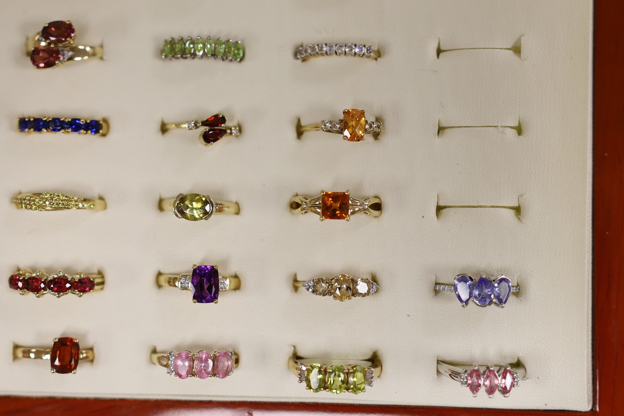 Thirty nine assorted modern 9ct gold and gem set dress rings, including amethyst and garnet and two 18ct gold and gem set rings, in ring box.